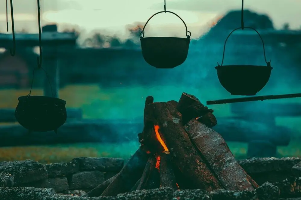Dramatic fire and smoke, evoking The Fat Duck's theatrical cooking style
